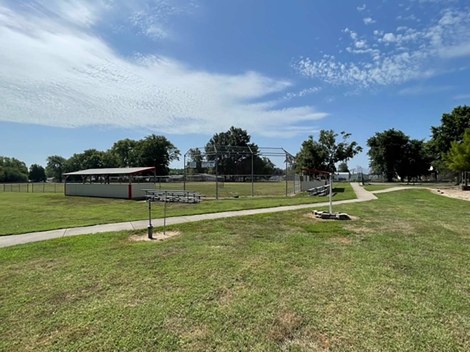 view of back stop and dugout at Plummer Park ball field