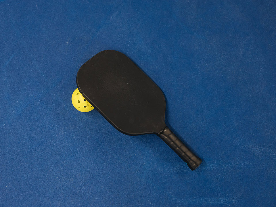 pickleball paddle and ball