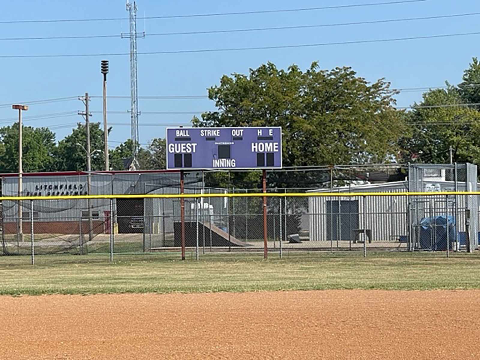 score board in the outfield at Schalk Field